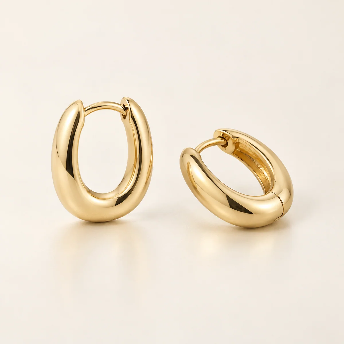 Noa Sculpted Hoops in yellow gold