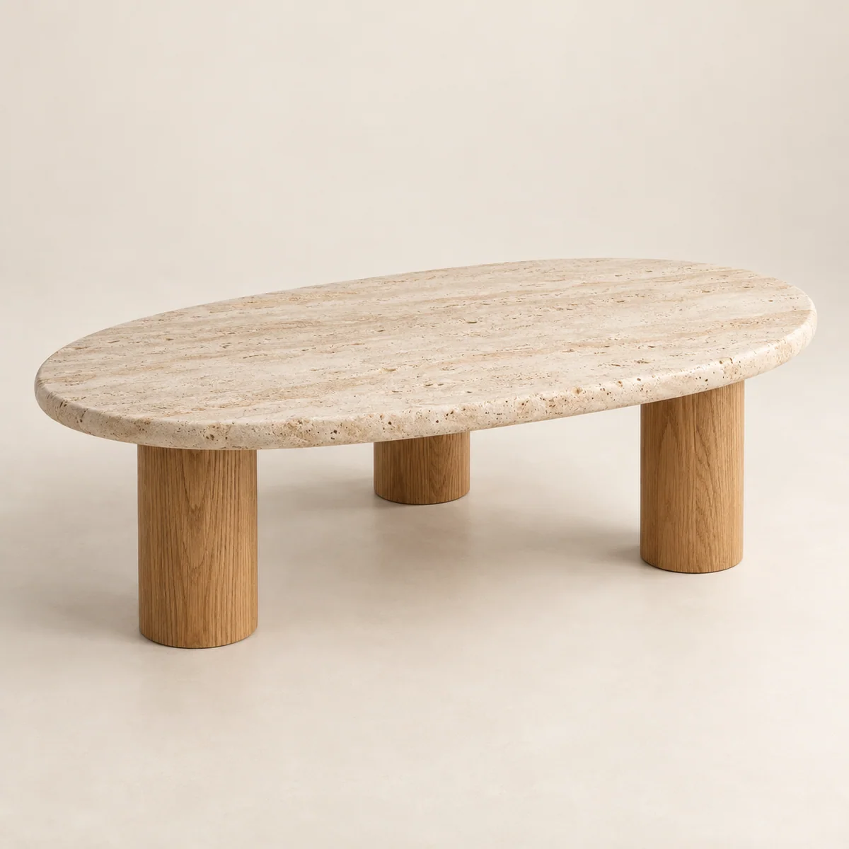 Halo coffee table with an oval travertine top and oak legs