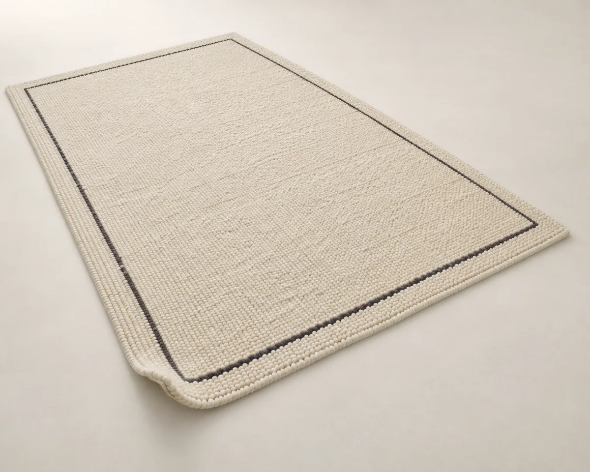 Loop Wool Rug in Natural wool · Charcoal border