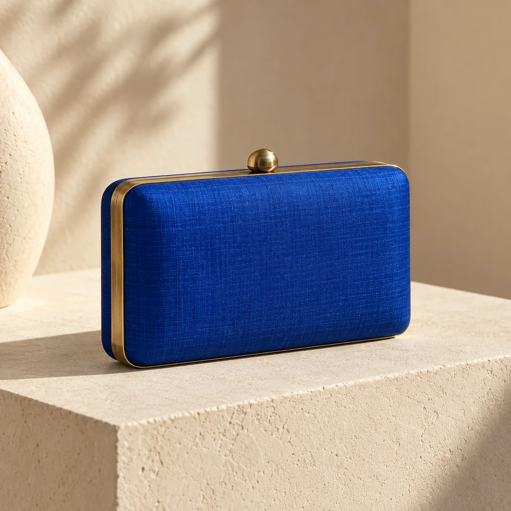 Interactive Kosha clutch: rotate the bag and open the hinged frame to see the lining